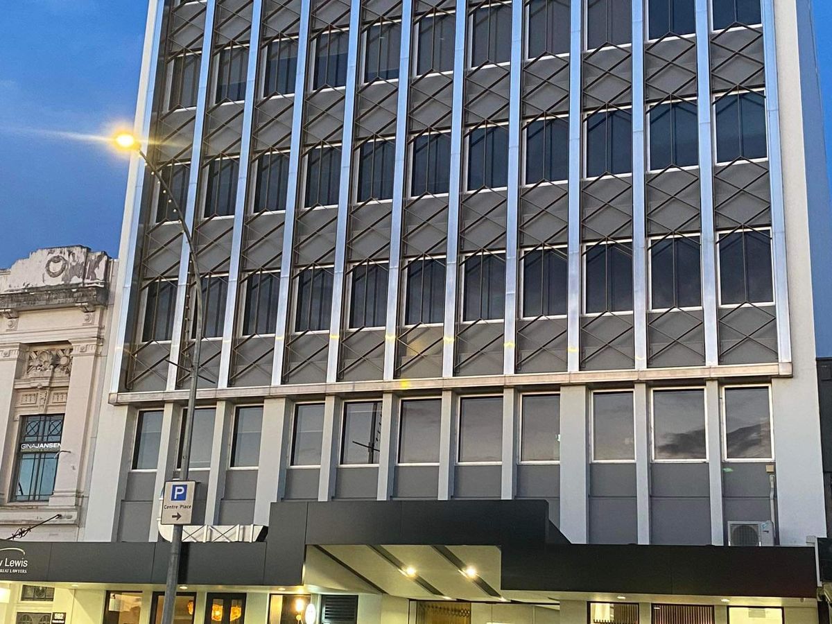 McCaw Lewis   Twilight Front Of Building